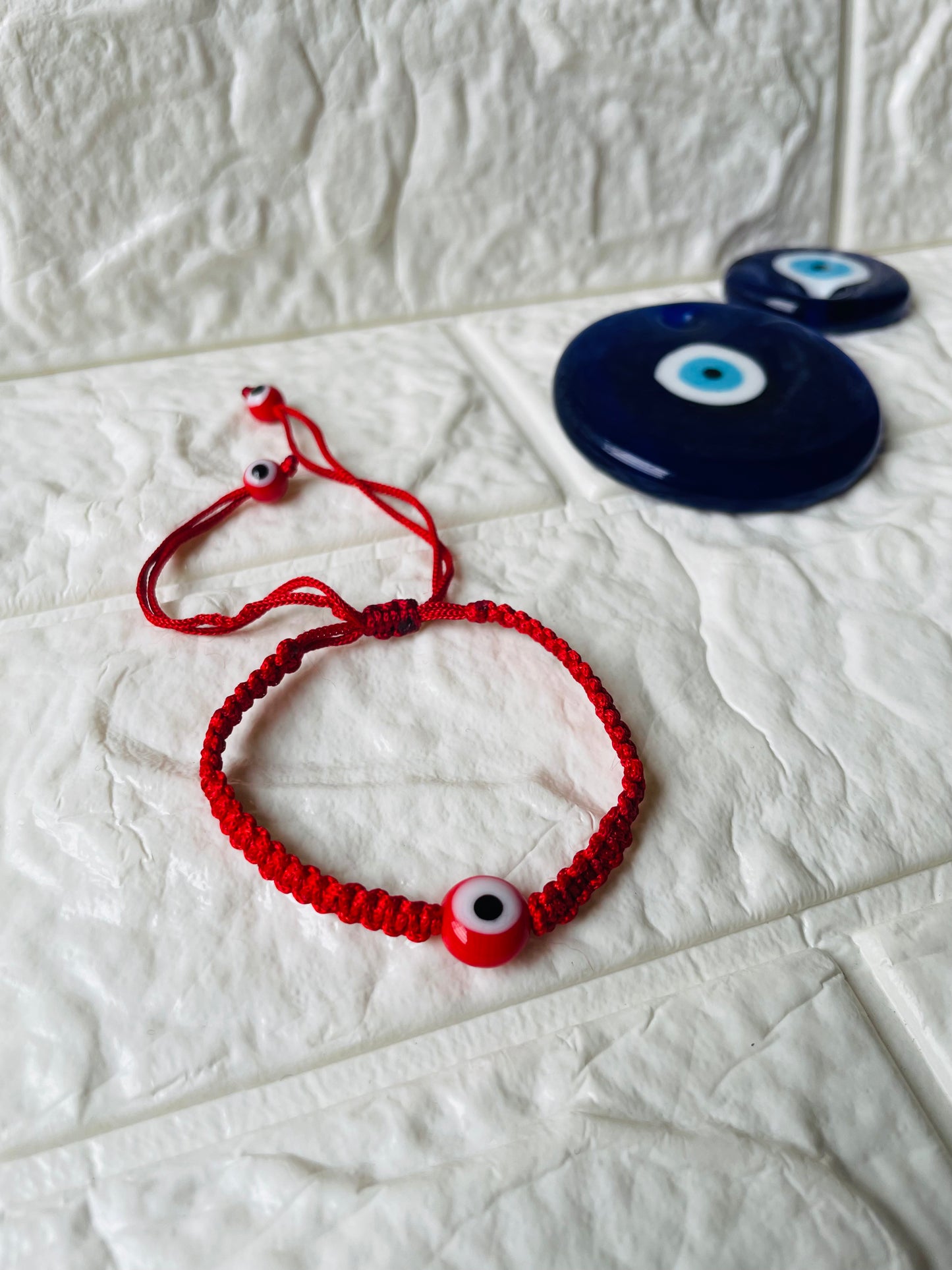 Evil Eye braided bracelet - Red - Teal By Tanvi