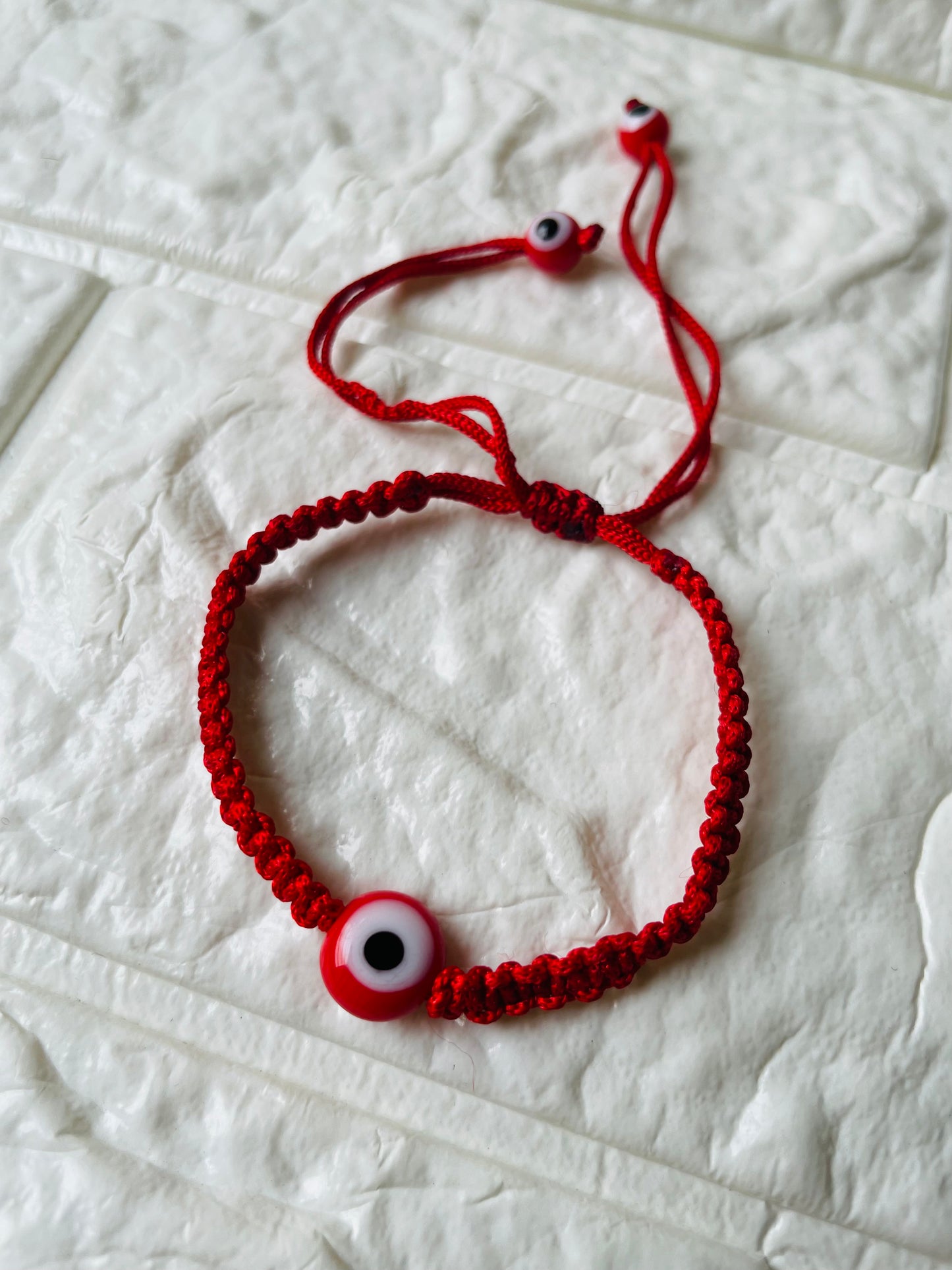 Evil Eye braided bracelet - Red - Teal By Tanvi