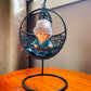 Baby Monk Buddha with Woollen cap on a Swing