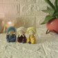 Baby Monk Buddha with woollen caps - Set of 4